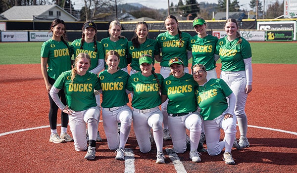 The UO Club Softball team poses on the infield